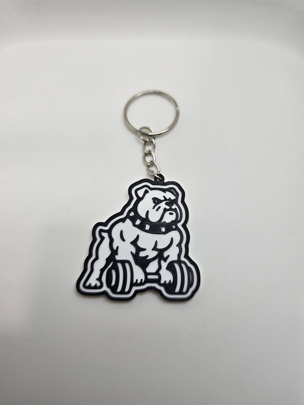 Napakowany Bulldog – brelok 3D 🐶💪