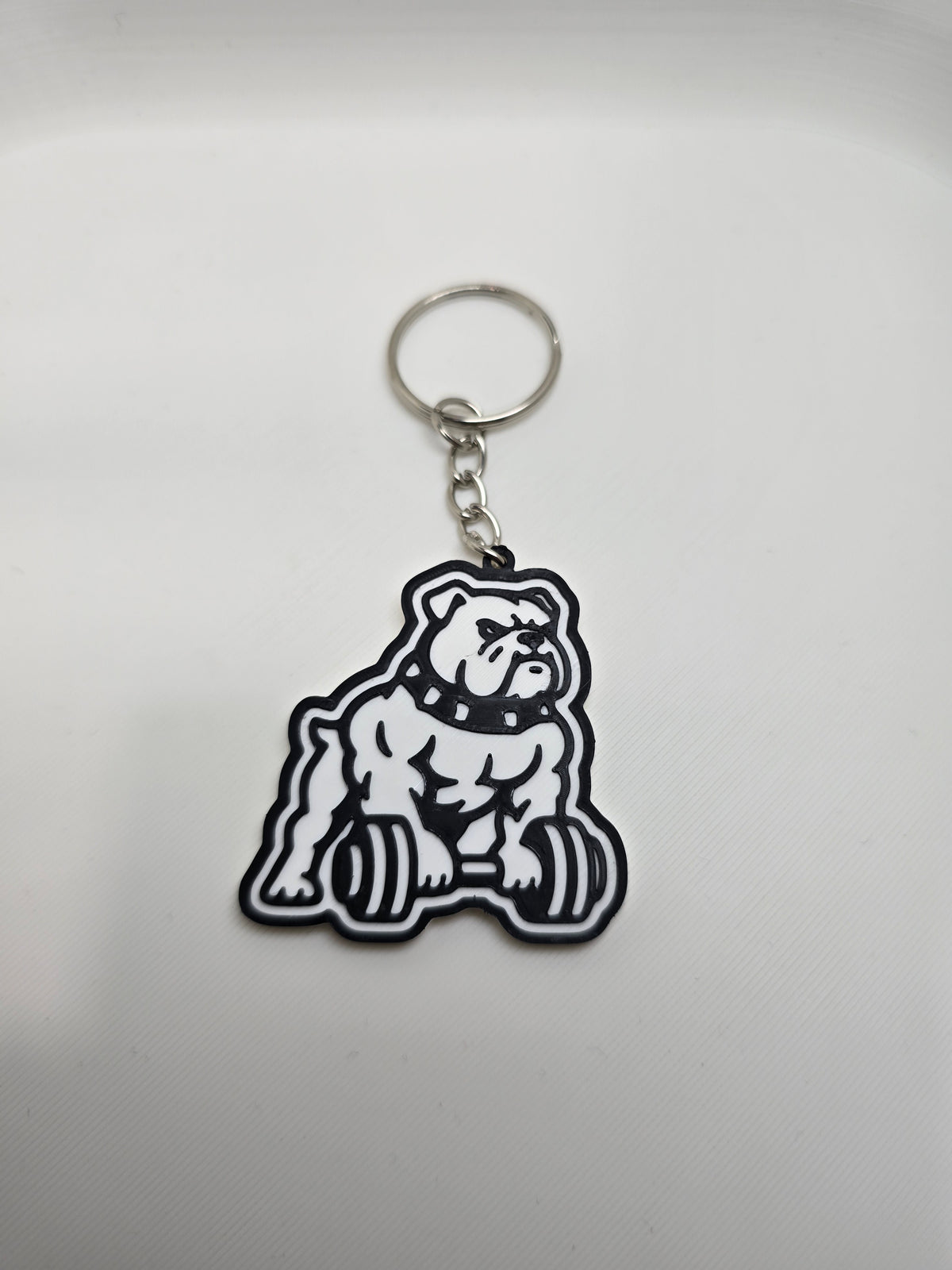 Napakowany Bulldog – brelok 3D 🐶💪